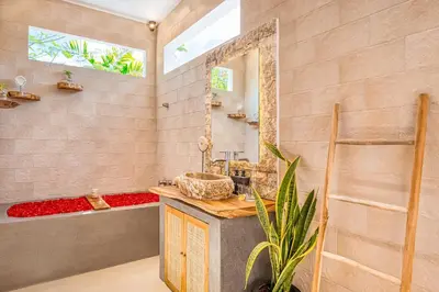 a bathroom with a sink and a bath tub at Villa San Diego: Brand New 4BDR in Seminyak