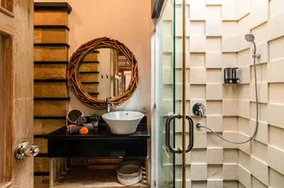 a bathroom with a sink and a mirror at PROMO DEAL Sweet Unique Hidden Gem 2 BD Villa - CONSTRUCTION NEARBY in Kerobokan