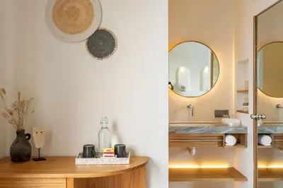 a bathroom with a sink and a mirror at Mysa Boutique Hotel in Seminyak