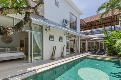 an exterior view of a villa with a swimming pool at Cosy 3 BR villa with private pool in Seminyak in Seminyak