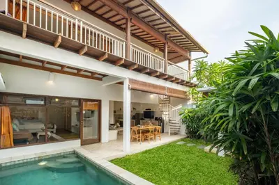an external view of a villa with a swimming pool at 3 Bedroom cozy private pool Villa in Seminyak WIFI in Seminyak