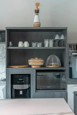 a kitchen with two microwaves and a microwave at Villa Koya : Luxurious and Modern 3BR Villa in Seminyak! in Seminyak
