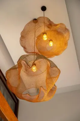 a chandelier is hanging from a ceiling at Stylish Tropical Villa 2 Br , Canggu , 400m To Finn Beach in Canggu