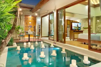 a pool in a room with a bed and a bedroom at Beautiful 1BR Private Pool Villa in Seminyak