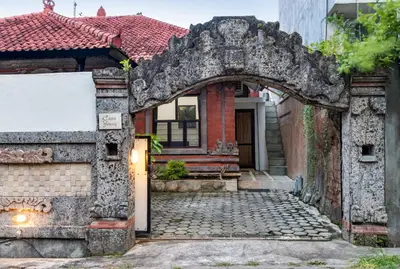 an archway in front of a house with a building at Casa Yenny Balinese Style Villa by GLOBALSTAY - Seminyak x Kuta x Canggu in Seminyak