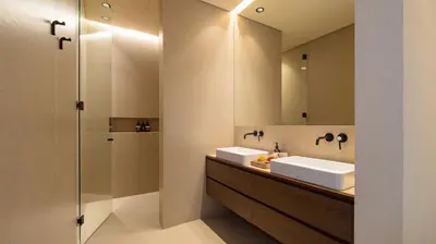 a bathroom with two sinks and a shower at Villa Fiji by Villa Finder in Canggu