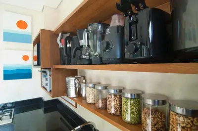 a kitchen with jars of food on a shelf at 3BR Villa Kita - Minggu Villas-Special Stay Bonus in Seminyak