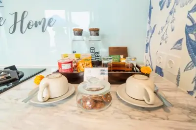 a kitchen counter with two dishes and a jar of food at Romantic 1 BR Villa with Private Pool in Seminyak