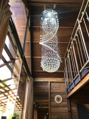 a chandelier hanging from the ceiling of a house at Villa Divna in Nusa Dua
