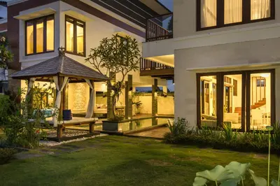 a house with a gazebo in a yard at Villa Club Corner Residence by Nagisa Bali in Canggu