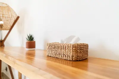 a basket sitting on top of a wooden table at Villa Arawan - Beautiful 3BR Villa in Kerobokan in Kerobokan