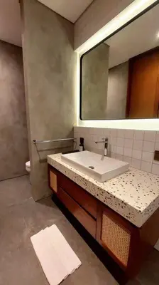 a bathroom with a sink and a mirror at Akhila 5 - 1 BR modern tropical villa at the heart of Seminyak in Seminyak
