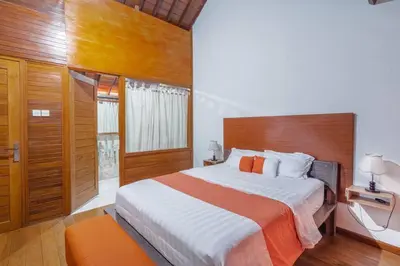 a bedroom with a large bed in a room at Private 3 Bedroom Villas, 5 mnt to Beach Nusa Dua in Nusa Dua