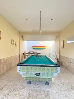 a room with a pool table in a room at Sorry we close in Seminyak