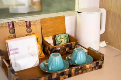 two blue cups and saucers in a wooden tray at Modern 3 BR Private Pool Villa in Legian
