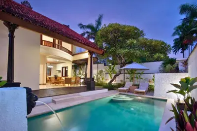 a swimming pool in the backyard of a house at Entire 2 BR Private Pool Villa in Seminyak