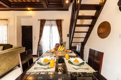 a dining room with a table with fruit on it at PROMO Uniquely Styled Spacious 3bd Villa in Kerobokan