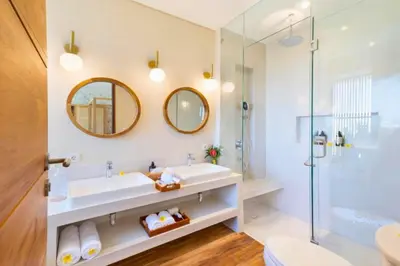 a bathroom with a sink and a shower at Garbera 2 BR Private Pool Villa in Canggu