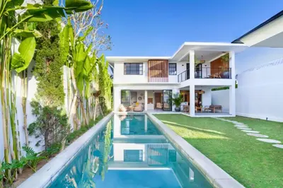 an exterior view of a house with a swimming pool at Garbera 2 BR Private Pool Villa in Canggu