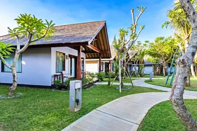 a house with a pathway in front of it at One BR Bungalow Cozy Place in Canggu