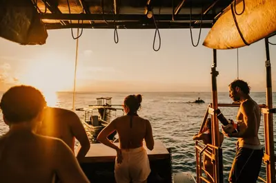 a group of people on a boat in the ocean at Floating Hotel SALTWATER COWBOYS in Kuta