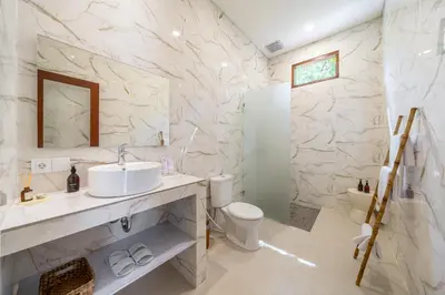 a white bathroom with a sink and a toilet at Aleksa - Villa with Rooftop&Rice Field View in Canggu