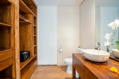 a bathroom with a sink and a toilet at Villa Casa Coral at Umalas in Kerobokan