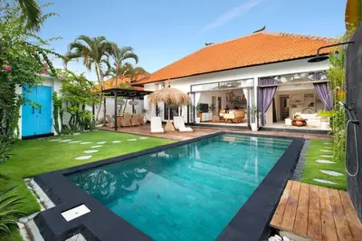a swimming pool in the backyard of a house at 3 Bedrooms Luxury Umalas with private pool in Kerobokan