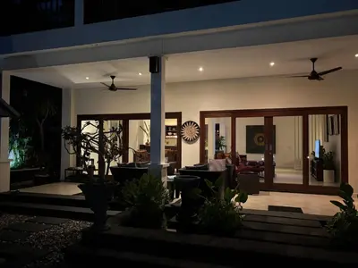a house with a living room at Villa Teratai in Seminyak