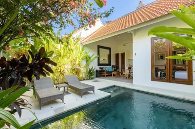 a villa with a swimming pool and a house at Paradise in the heart of Seminyak, 1-BR Pool-Villa in Seminyak