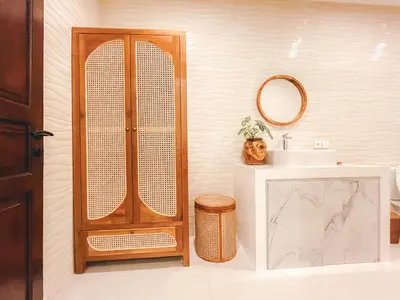 a bathroom with a wooden shower and a sink at Villa Zanetta By Bali Asia Villa in Kerobokan