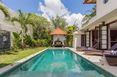 a swimming pool in the backyard of a villa at Luxury Hideaway 4 Br Villa 5 minutes to the beach in Seminyak