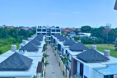 an overhead view of a row of houses with roofs at Lariska 1 BR Superior Queen Room in Jimbaran