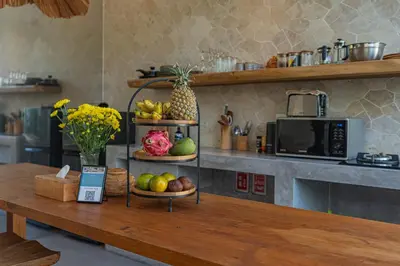 a kitchen with a table with fruit on it at Cozy 2 beds villa in Seminyak in Seminyak