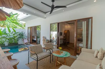 a living room with a couch and a table at Cozy 2 beds villa in Seminyak in Seminyak