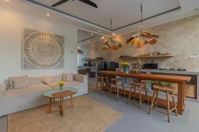 a living room with a couch and a table at Cozy 2 beds villa in Seminyak in Seminyak