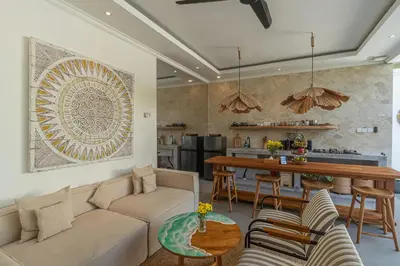 a living room with a couch and a table at Cozy 2 beds villa in Seminyak in Seminyak