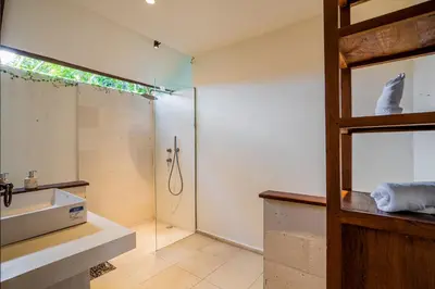 a bathroom with a shower and a sink at Villa NUSA - 3BR Villa in Umalas next to Nook in Kerobokan