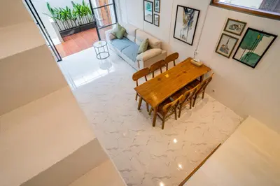 an overhead view of a living room with a table and a couch at NEW! Villa Sony 1 - 3BR Villa next to Legian Beach in Seminyak