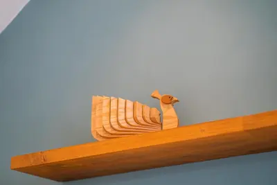 a wooden figurine of a snail on a shelf at NEW! Villa Sony 1 - 3BR Villa next to Legian Beach in Seminyak