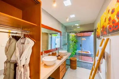 a bathroom with two sinks and a large mirror at Sadawira 1 BR Private Pool Villa & Bathtub ZN168 in Legian