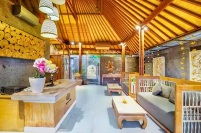 a living room with a couch and a table at Sadawira 1 BR Private Pool Villa & Bathtub ZN168 in Legian