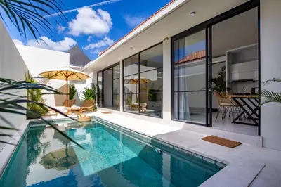 an indoor swimming pool in a villa at Letto 1 - Luxurious Villa with Pool in Canggu in Canggu