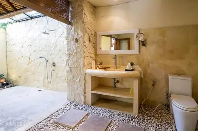 a bathroom with a sink and a shower at Tropical 3BR villa in the heart of Seminyak in Seminyak