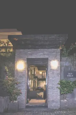 a small brick building with a window and lights at 20 off Special Brilliant Location in Seminyak