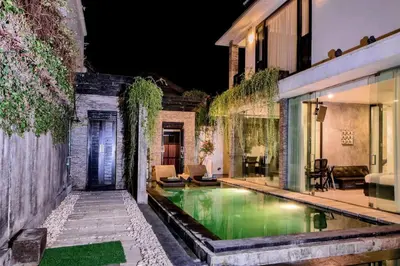 a swimming pool in the middle of a house at 20 off Special Brilliant Location in Seminyak