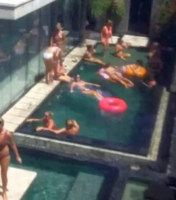 a group of people in a pool with a frisbee at 20 off Special Brilliant Location in Seminyak
