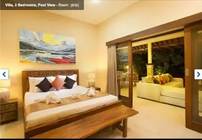 a bedroom with a bed with two stuffed animals on it at Seminyak Beach Villa Ashira SUPERB Location in Seminyak