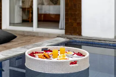 a bowl of food sitting in a swimming pool at Villa Felicia Canggu By Moria in Canggu
