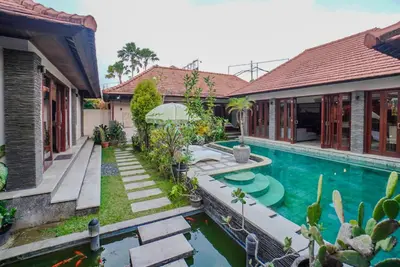 an image of a house with a swimming pool at Villa Di Bucu, Canggu in Canggu